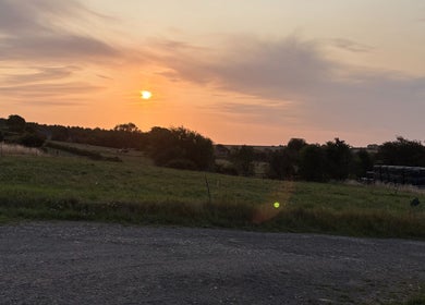 Sunset over serene countryside near Revive Massage and Scar Therapy, Chipping Campden, England, GB.