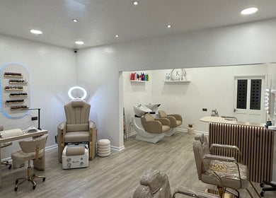 Modern interior of Diva’s Beauty Studio, Hull, England, GB, featuring chic salon chairs and clean design.