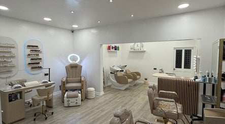 Modern interior of Diva’s Beauty Studio, Hull, England, GB, featuring chic salon chairs and clean design.
