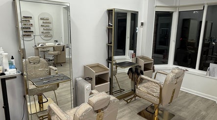 Sleek salon setup at Diva’s Beauty Studio in Hull, England, GB, featuring modern chairs and styling stations.