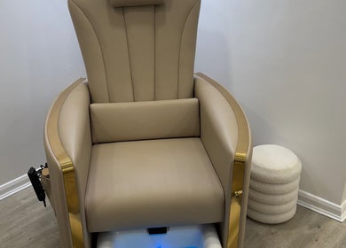 Elegant pedicure chair at Diva’s Beauty Studio in Hull, England, GB, featuring plush upholstery and modern design.