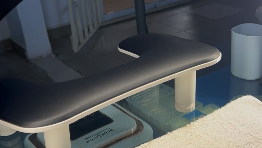 The Nailtique manicure station in Lagos, Lagos, NG, featuring a sleek armrest and modern design.