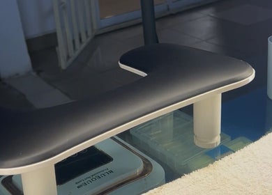 The Nailtique manicure station in Lagos, Lagos, NG, featuring a sleek armrest and modern design.