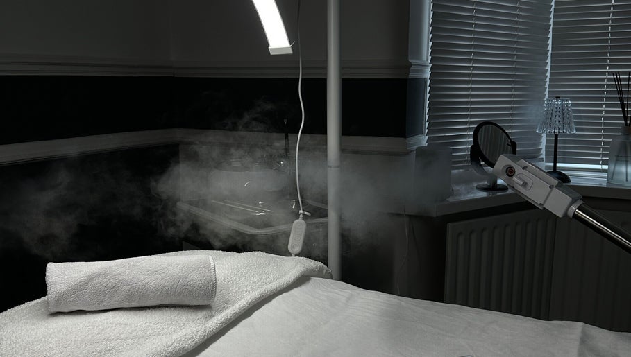 Elysian Skin's tranquil therapy room with steam treatment setup in Birmingham, England, GB.