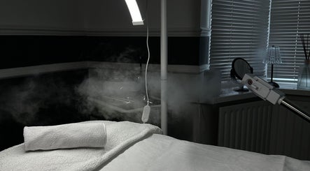 Elysian Skin's tranquil therapy room with steam treatment setup in Birmingham, England, GB.