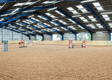 Spacious indoor arena at Marwood Equestrian, Barnard Castle, England, GB for equestrian training and events.