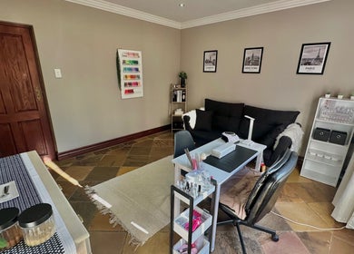Modern nail studio at Nude by Nicole, Kempton Park, Gauteng, ZA featuring a stylish setup and decor.