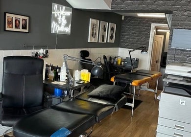Interior of Mind Over Matter Tattoo Studio, Hazel Grove, England, GB, showcasing modern tattoo stations.
