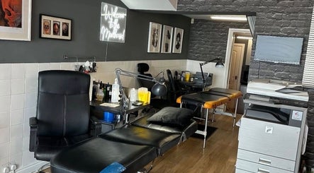 Interior of Mind Over Matter Tattoo Studio, Hazel Grove, England, GB, showcasing modern tattoo stations.