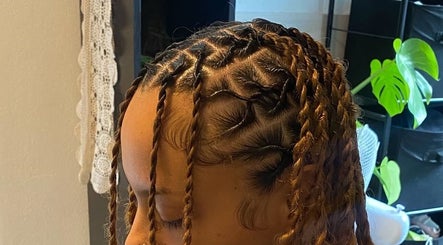Stylish braided hairstyle created at Thee Glam Lab in Kingston, Ontario, CA, showcasing detailed artistry.