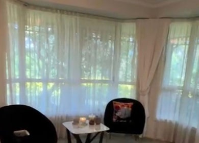 Relaxing seating area in Lumera Beauty, West Pennant Hills, New South Wales, AU with plush chairs and a table.