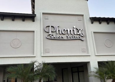 Entrance of Two Chairs Salon in Boca Raton, Florida, US with modern exterior design.