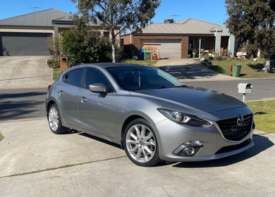 Sleek car polished by JD Automotive Detailing, Springdale Heights, New South Wales, AU, parked on driveway.