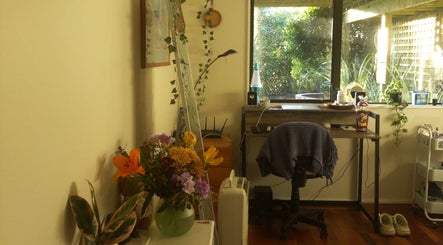 Tranquil workspace with plants at llashionista, Wellington, Wellington Region, NZ.