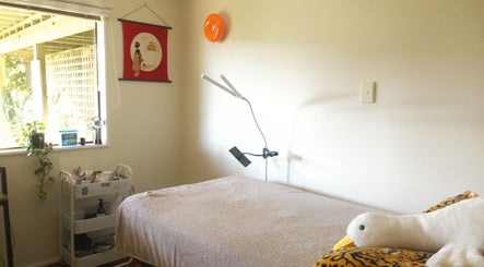 Relaxing treatment room at llashionista in Wellington, Wellington Region, NZ with a massage bed and serene decor.