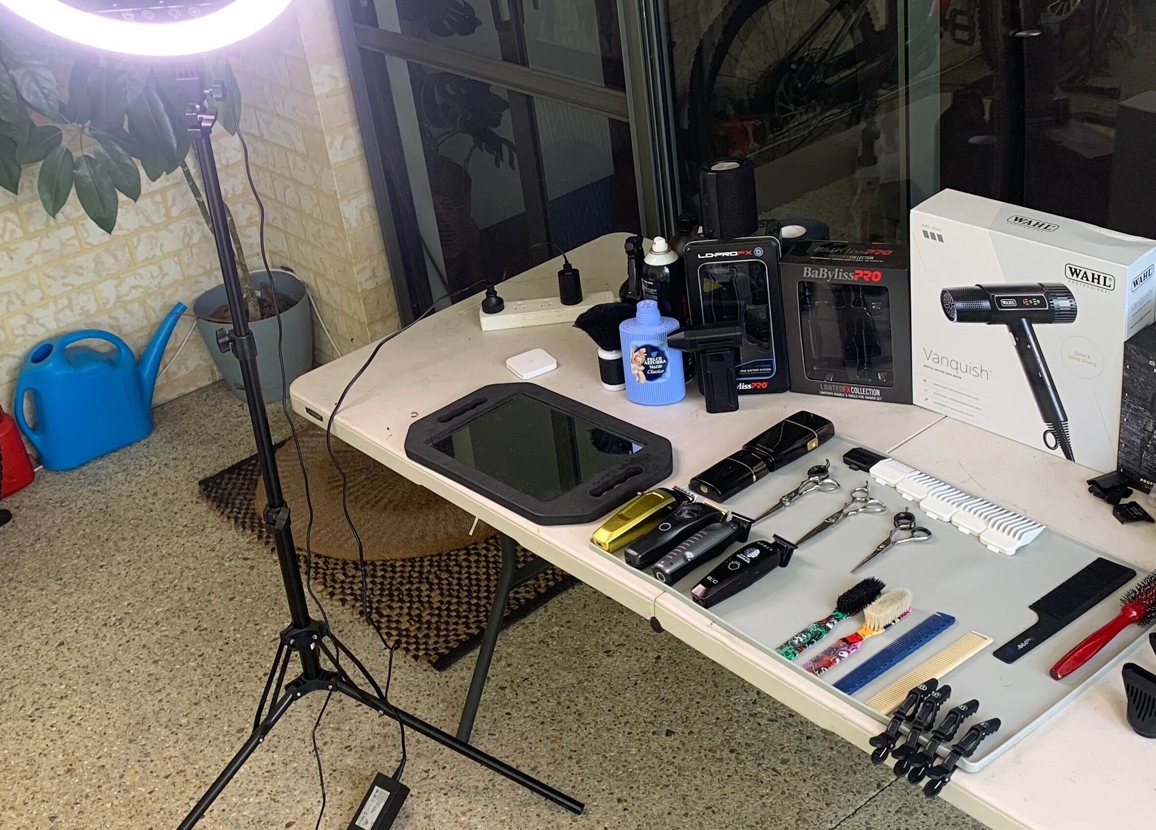 Hair tools setup at Brody.fadez in Banksia Grove, Western Australia, AU, including clippers, brushes, and styling products.