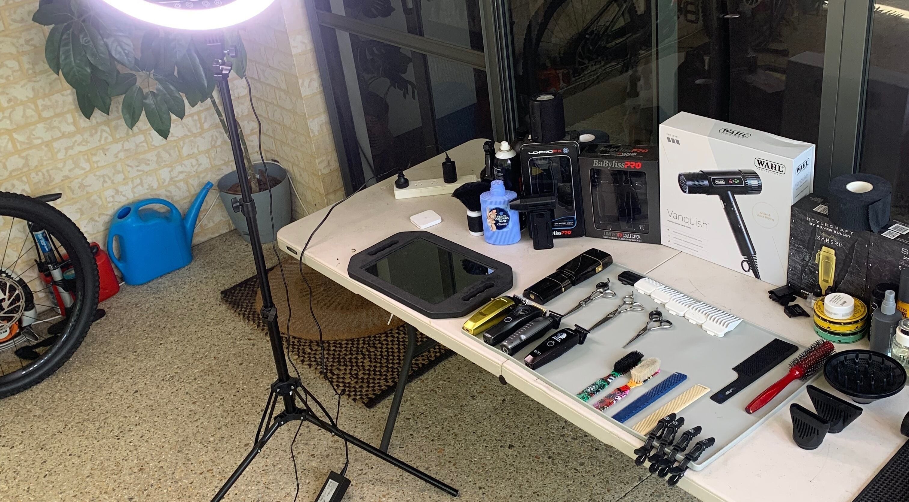 Hair tools setup at Brody.fadez in Banksia Grove, Western Australia, AU, including clippers, brushes, and styling products.