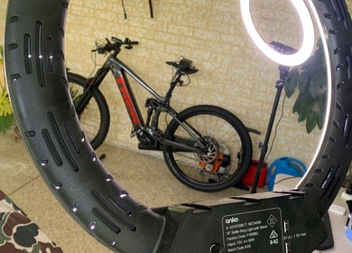 Brody.fadez setup in Banksia Grove, WA, showcasing a ring light and bicycle in the background.