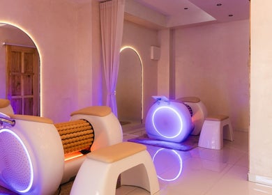 Modern massage chairs in calming ambiance at Sculpt Lab, Bedfordview, Gauteng, ZA.
