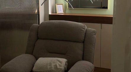 Comfortable chair in serene setting at Elixira Ladies Beauty Lounge, Abu Dhabi, Abu Dhabi, AE.