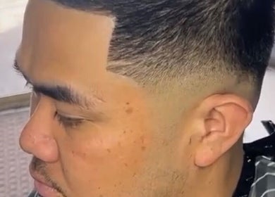 Close-up of a stylish fade haircut at Castro&cut, Melbourne, Victoria, AU.