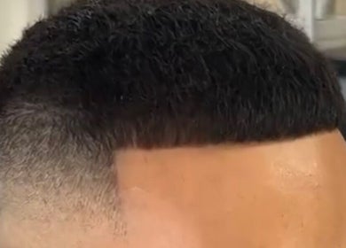 Sharp fade haircut at Castro&cut, Melbourne, Victoria, AU showcasing expert barber skill.