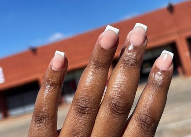 Elegant French manicure at Gifted Handz in Pretoria, Gauteng, ZA, highlighting detailed nail artistry.