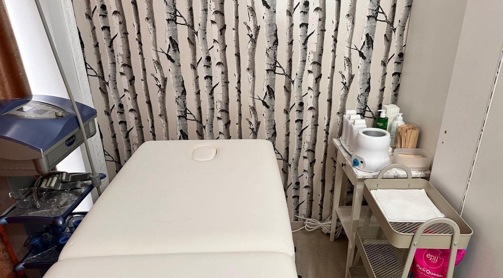 Relaxing treatment room at Look At Me Beauty Salon in Giroc, Județul Timiș, RO with a serene setup.