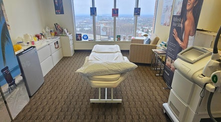 Serene treatment room at Body Sculpt Skin Laser in Vienna, Virginia, US, with a view of the cityscape.