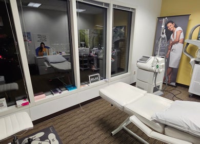 Relaxing treatment room at Body Sculpt Skin Laser, Vienna, Virginia, US, showcasing state-of-the-art equipment.