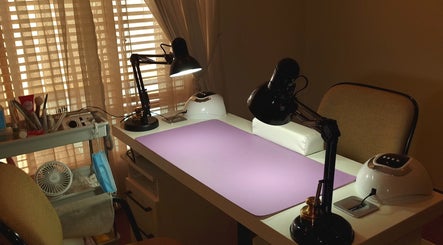 Elegant nail workstation at Nails by Tazmé in Roodepoort, Gauteng, ZA with tools and ambient lighting.