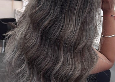Stylish hair waves at Erdem Hair London, London, England, GB showcasing sleek and modern hairstyles.