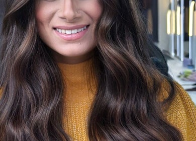 Elegant hairstyle at Erdem Hair London, showcasing beautiful waves. Located in London, England, GB.