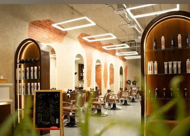 Elegant interior of شارب لوك Sharp Look salon in Riyadh, Riyadh Province, SA, featuring modern design.