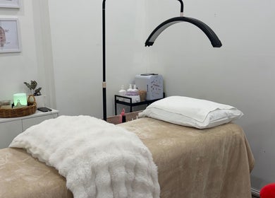 Relaxing treatment room at The Beauty Atelier, Melbourne, Victoria, AU with plush linens and tranquil decor.