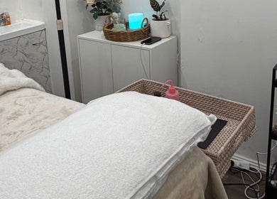 Relaxing treatment room at The Beauty Atelier, Melbourne, Victoria, AU with cozy, elegant decor.