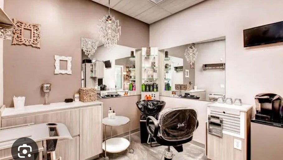 Elegant salon interior at Glamour and Glitter by Jessica in Greenwood, South Carolina, US, showcasing chic decor.