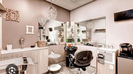 Elegant salon interior at Glamour and Glitter by Jessica in Greenwood, South Carolina, US, showcasing chic decor.