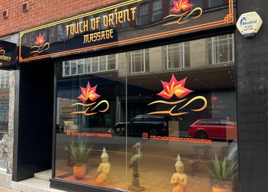 Front view of Touch of Orient venue in Reading, England, GB featuring decorative signage and elegant window design.