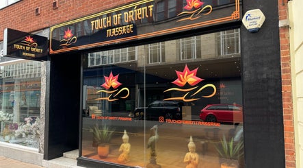 Front view of Touch of Orient venue in Reading, England, GB featuring decorative signage and elegant window design.