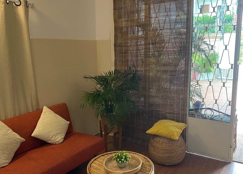 Comfortable seating area with plants at Maison Alex, Phnom Penh, Phnom Penh, KH.