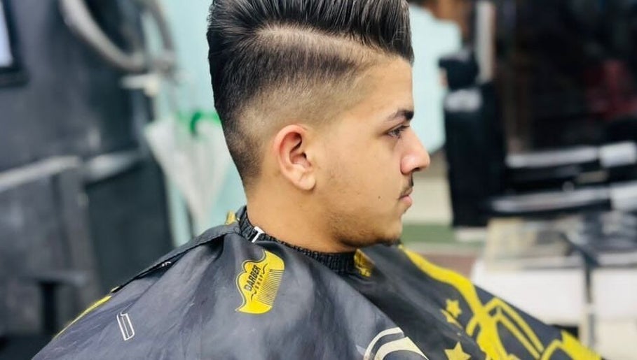 Customer with styled fade haircut at Smart Cut Barber, Kuala Lumpur, Wilayah Persekutuan Kuala Lumpur, MY.