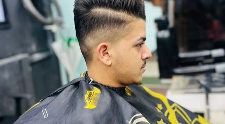 Customer with styled fade haircut at Smart Cut Barber, Kuala Lumpur, Wilayah Persekutuan Kuala Lumpur, MY.