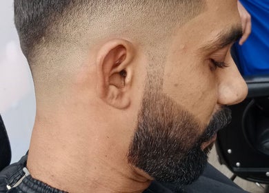 Close-up of a precision haircut at Smart Cut Barber, Kuala Lumpur, Wilayah Persekutuan Kuala Lumpur, MY.