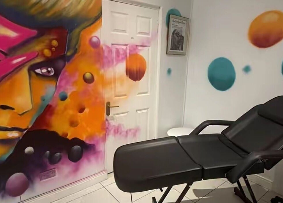 Vibrant mural and relaxing chair in Lunar Lines, Newhaven, England, GB.