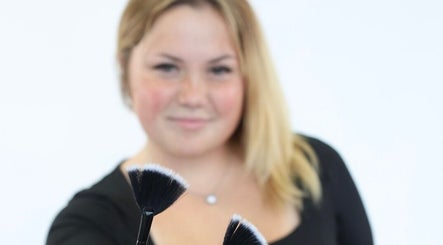 Makeup artist at BB Esthetics in Lyman, South Carolina, US, showcasing a makeup brush.