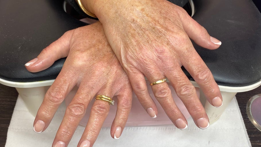 Freshly manicured hands on display at Arch Design Beauty, Tamworth, England, GB.