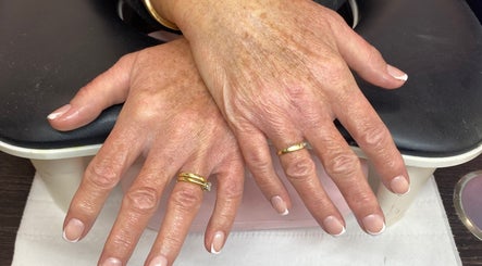 Freshly manicured hands on display at Arch Design Beauty, Tamworth, England, GB.
