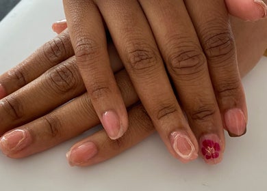 Elegant floral nail art at Arch Design Beauty, Tamworth, England, GB. Perfect for a stylish manicure.