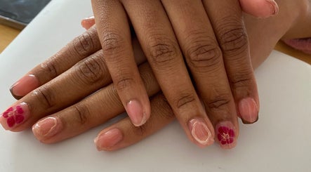 Elegant floral nail art at Arch Design Beauty, Tamworth, England, GB. Perfect for a stylish manicure.